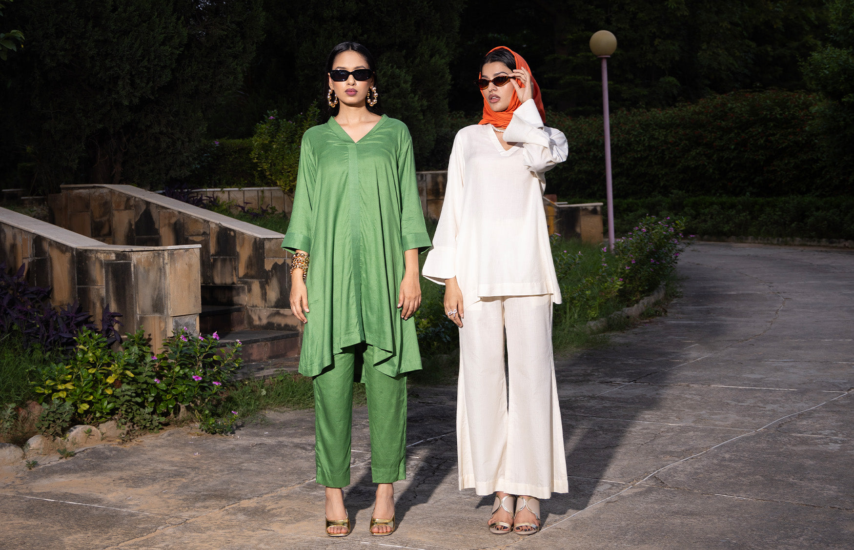 Eri Silk Ahimsa Silk Clothing for Women that is green and white in colour, made with real silk, Kurta Pyjama set and coord set that is for occasions and everyday wear.Two women wearing rich Indian fabrics that support artisans and are sustainable and good for the environment, cause minimal waste and are made with organic practices. Made with Cruelty free silk. 